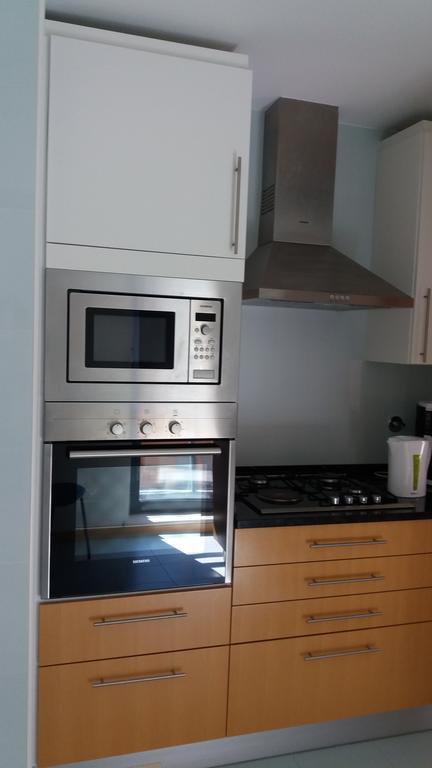 Apartamento Novo Com Piscina Ольян Экстерьер фото